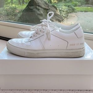 Woman by Common Projects